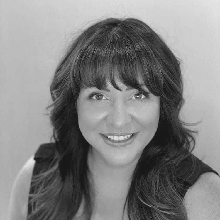 Portrait of CARRIE LABRECQUE, a professional stylist at Cassandra Salon & Spa, showcasing their expertise and style.