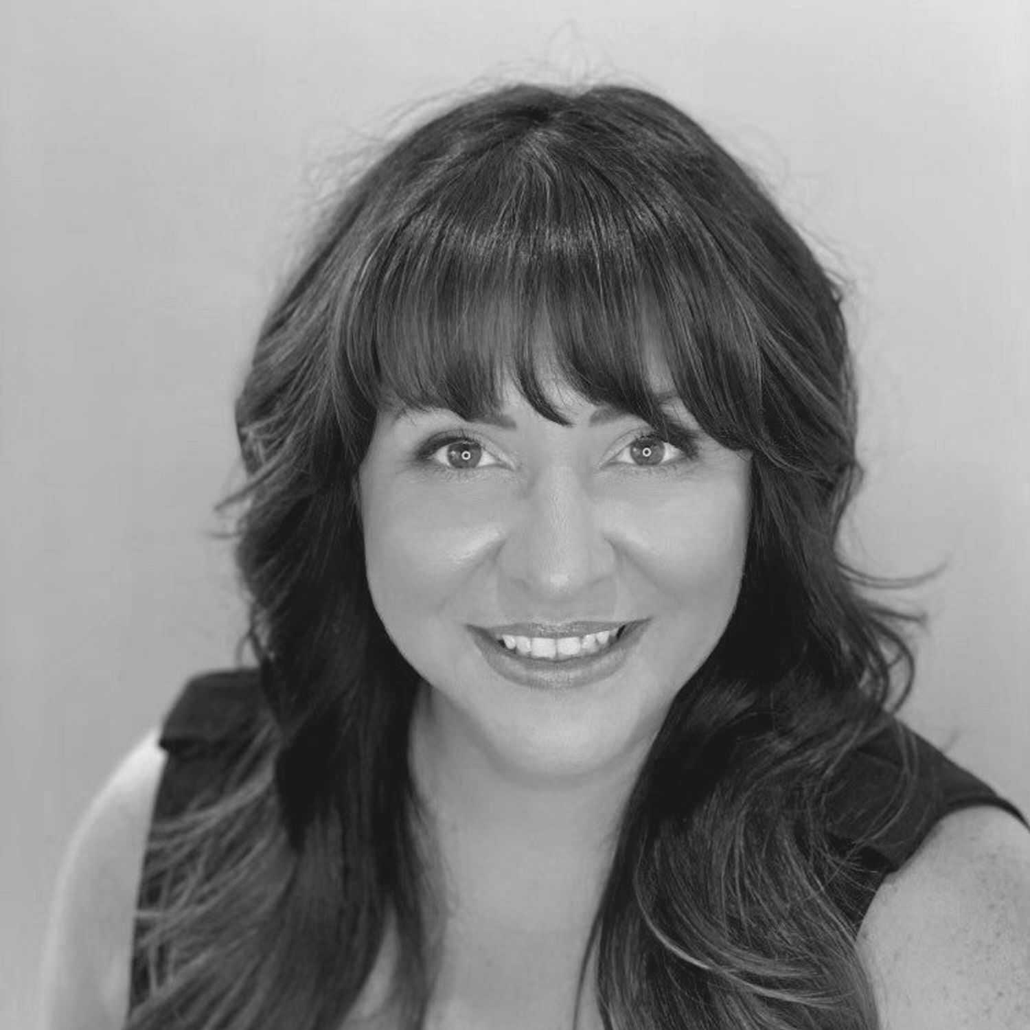 Portrait of CARRIE LABRECQUE, a professional stylist at Cassandra Salon & Spa, showcasing their expertise and style.