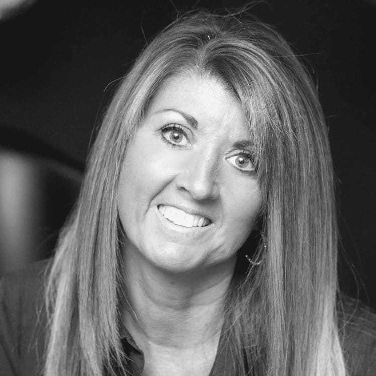 Portrait of LAURI DREW, a professional stylist at Cassandra Salon & Spa, showcasing their expertise and style.