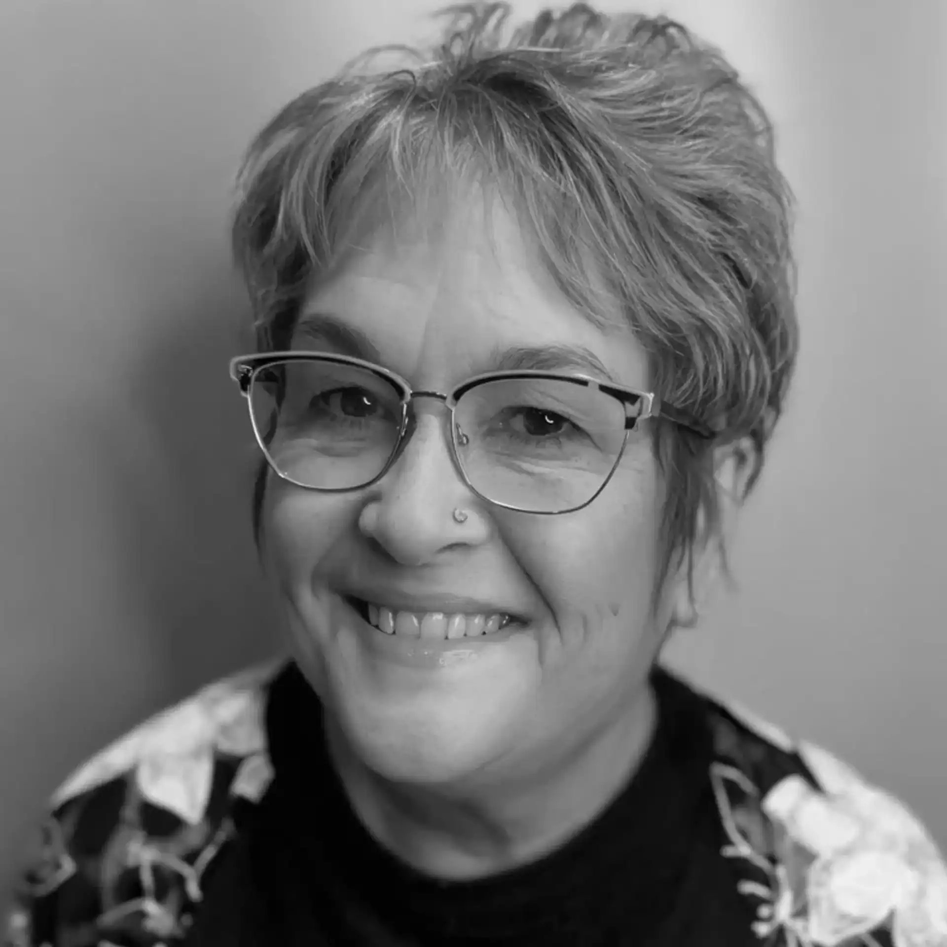 Portrait of DIANE SAWYER, a professional stylist at Cassandra Salon & Spa, showcasing their expertise and style.