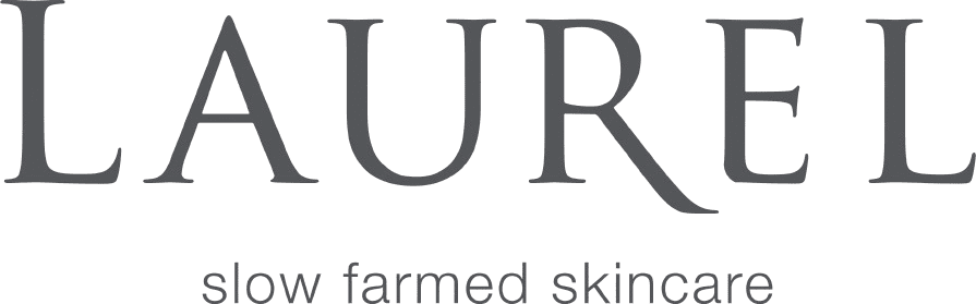 Laurel logo with tagline "slow farmed skincare" below it.