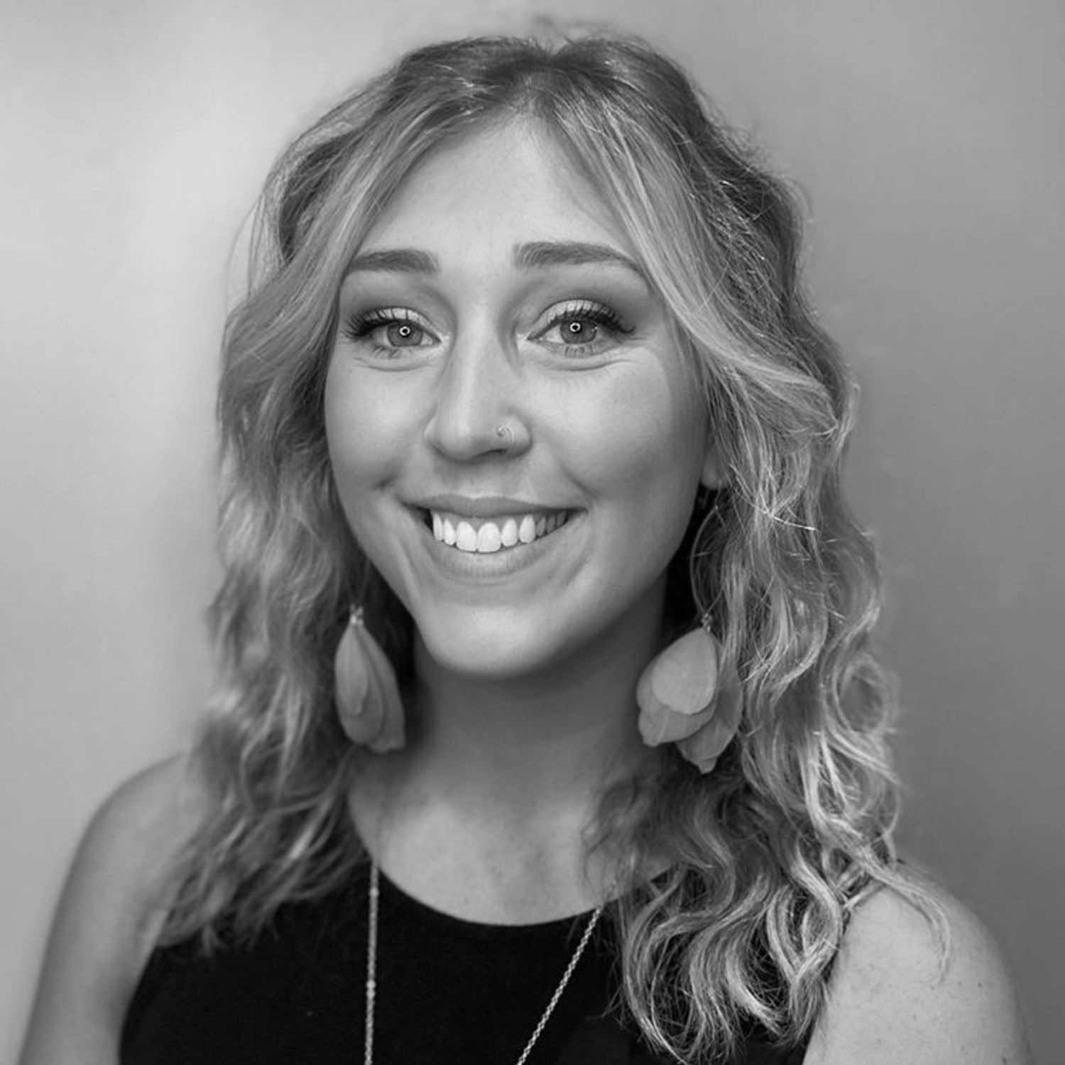 Portrait of STEPH MAYO, a professional stylist at Cassandra Salon & Spa, showcasing their expertise and style.