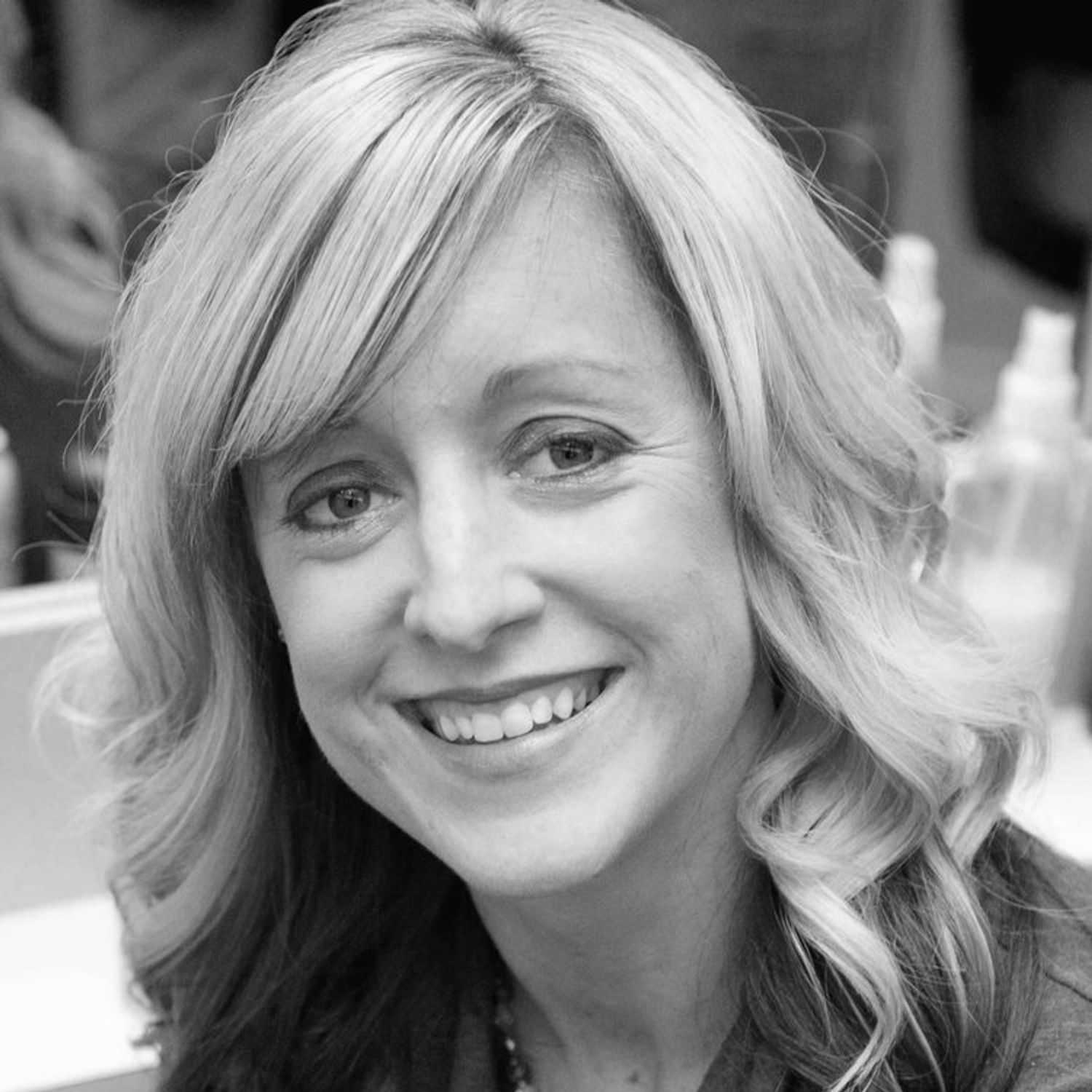 Portrait of HEATHER GRISE, a professional stylist at Cassandra Salon & Spa, showcasing their expertise and style.