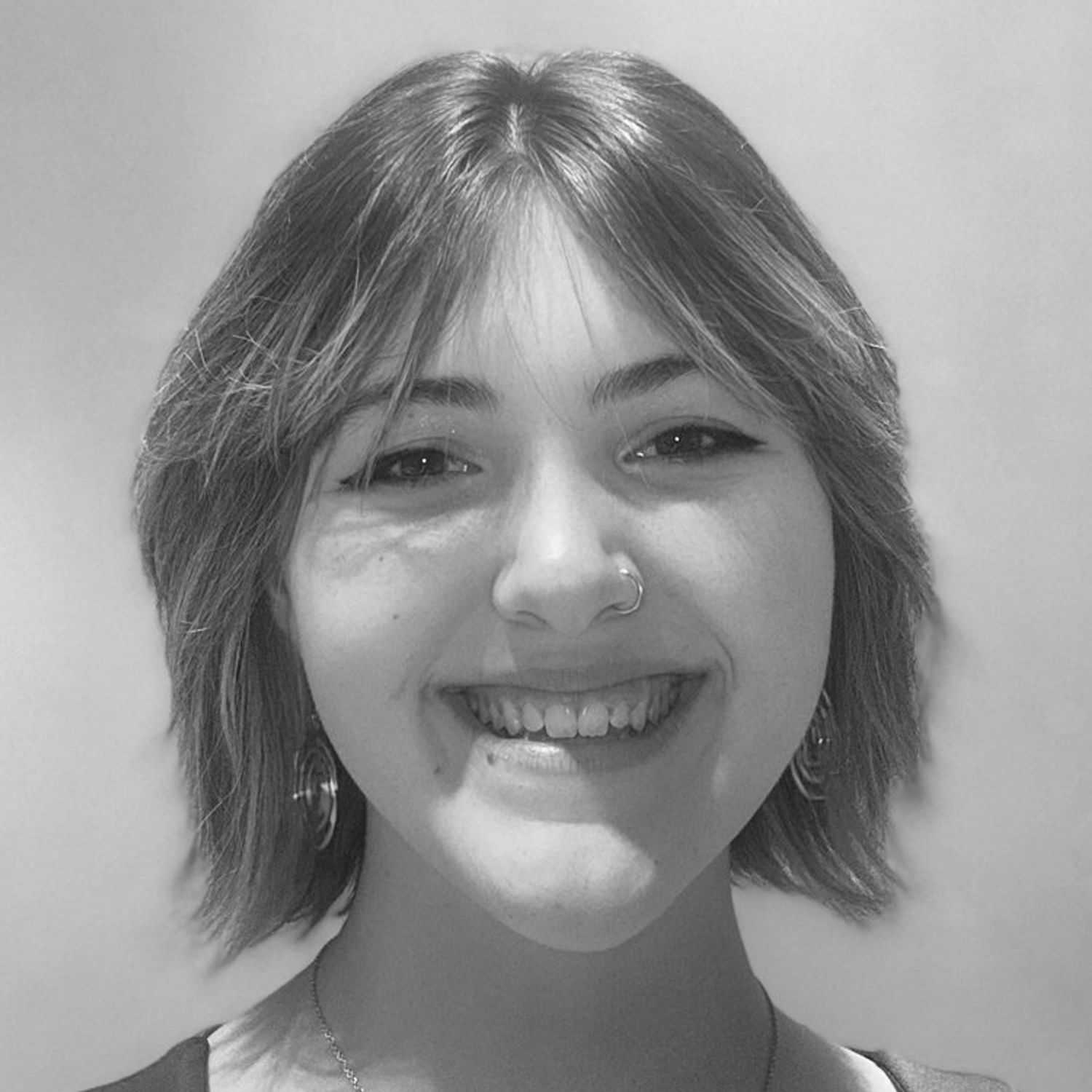 Portrait of ADELAIDE LEARY, a professional stylist at Cassandra Salon & Spa, showcasing their expertise and style.