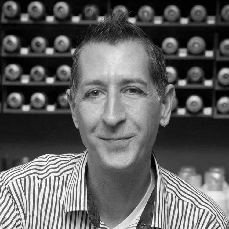 Portrait of SKY, a professional stylist at Cassandra Salon & Spa, showcasing their expertise and style.