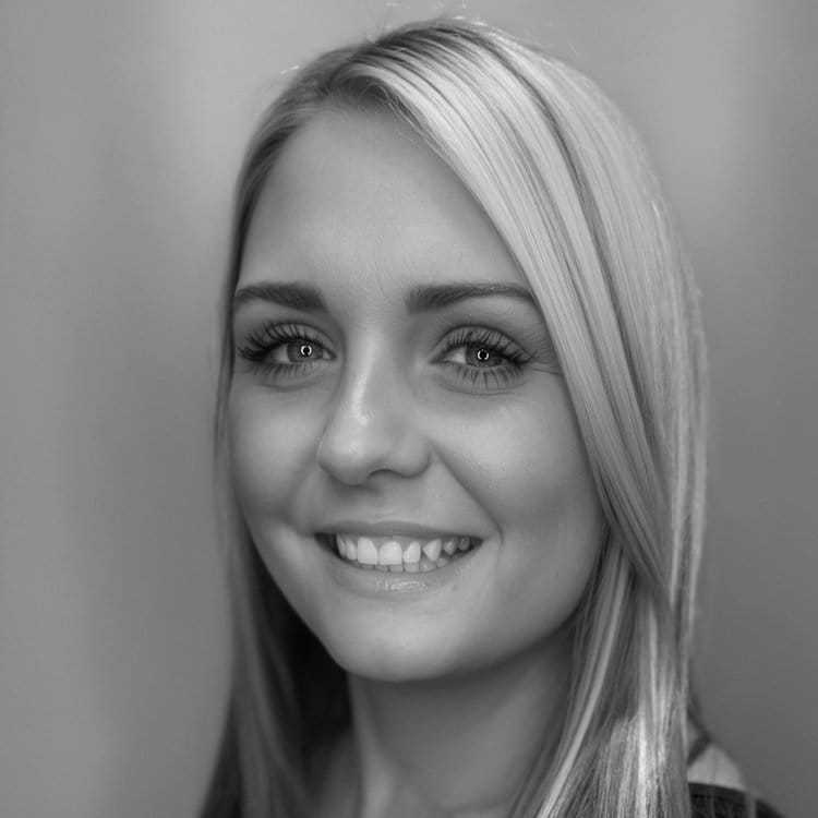 Portrait of CANDACE SMITH, a professional stylist at Cassandra Salon & Spa, showcasing their expertise and style.