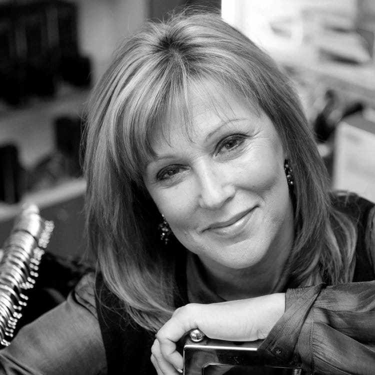 Portrait of SANDRA VAILLANCOURT, a professional stylist at Cassandra Salon & Spa, showcasing their expertise and style.