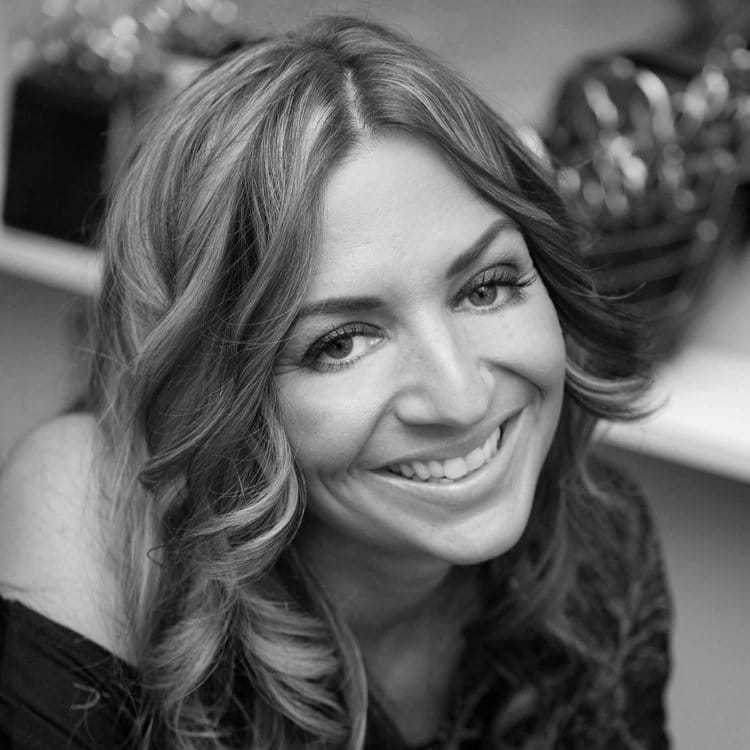 Portrait of KRISTIN ATKINS, a professional stylist at Cassandra Salon & Spa, showcasing their expertise and style.