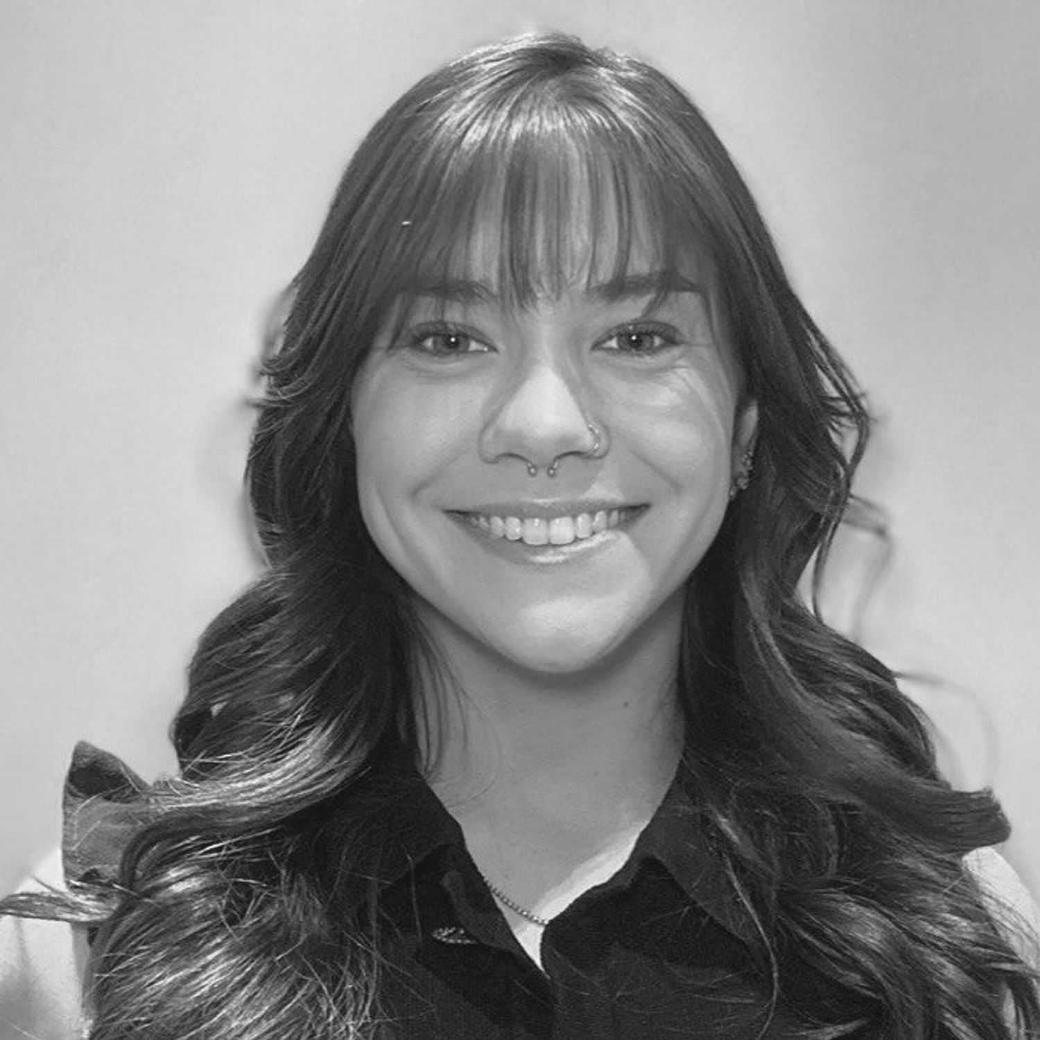 Portrait of EMILY GARDINER, a professional stylist at Cassandra Salon & Spa, showcasing their expertise and style.