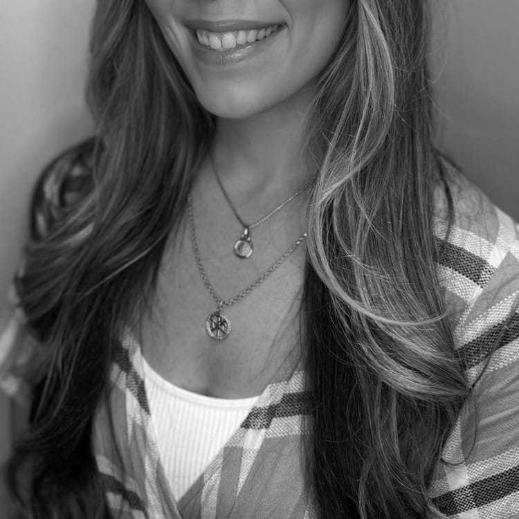 Portrait of KYLIE RIGNEY, a professional stylist at Cassandra Salon & Spa, showcasing their expertise and style.