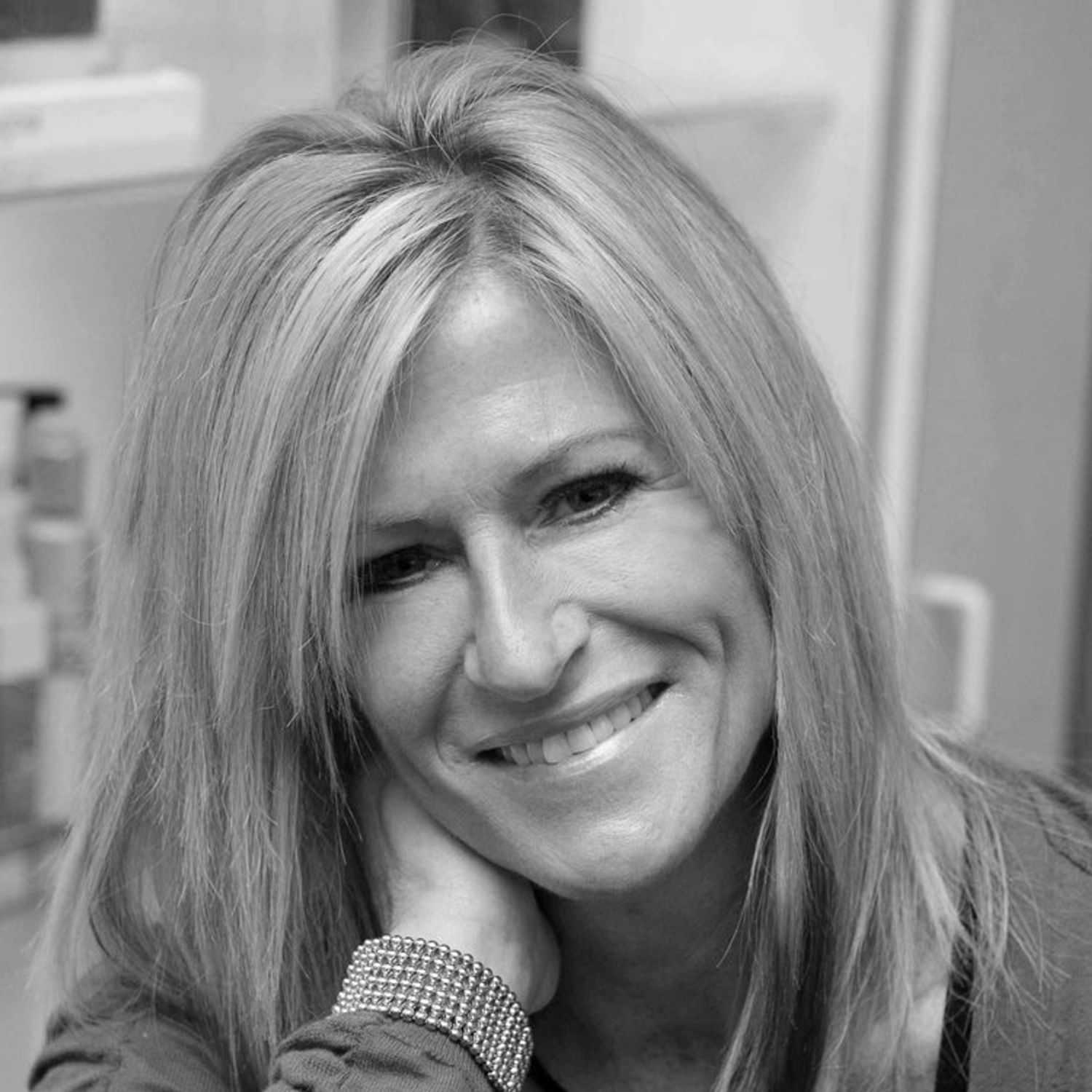 Portrait of LINDA GORTON, a professional stylist at Cassandra Salon & Spa, showcasing their expertise and style.