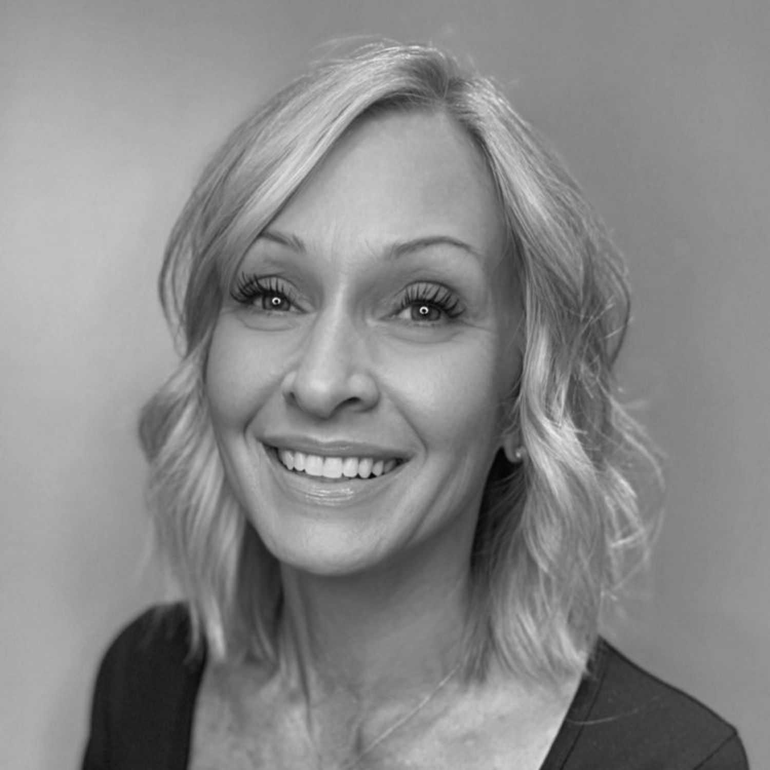 Portrait of KIM BOHENKO, a professional stylist at Cassandra Salon & Spa, showcasing their expertise and style.