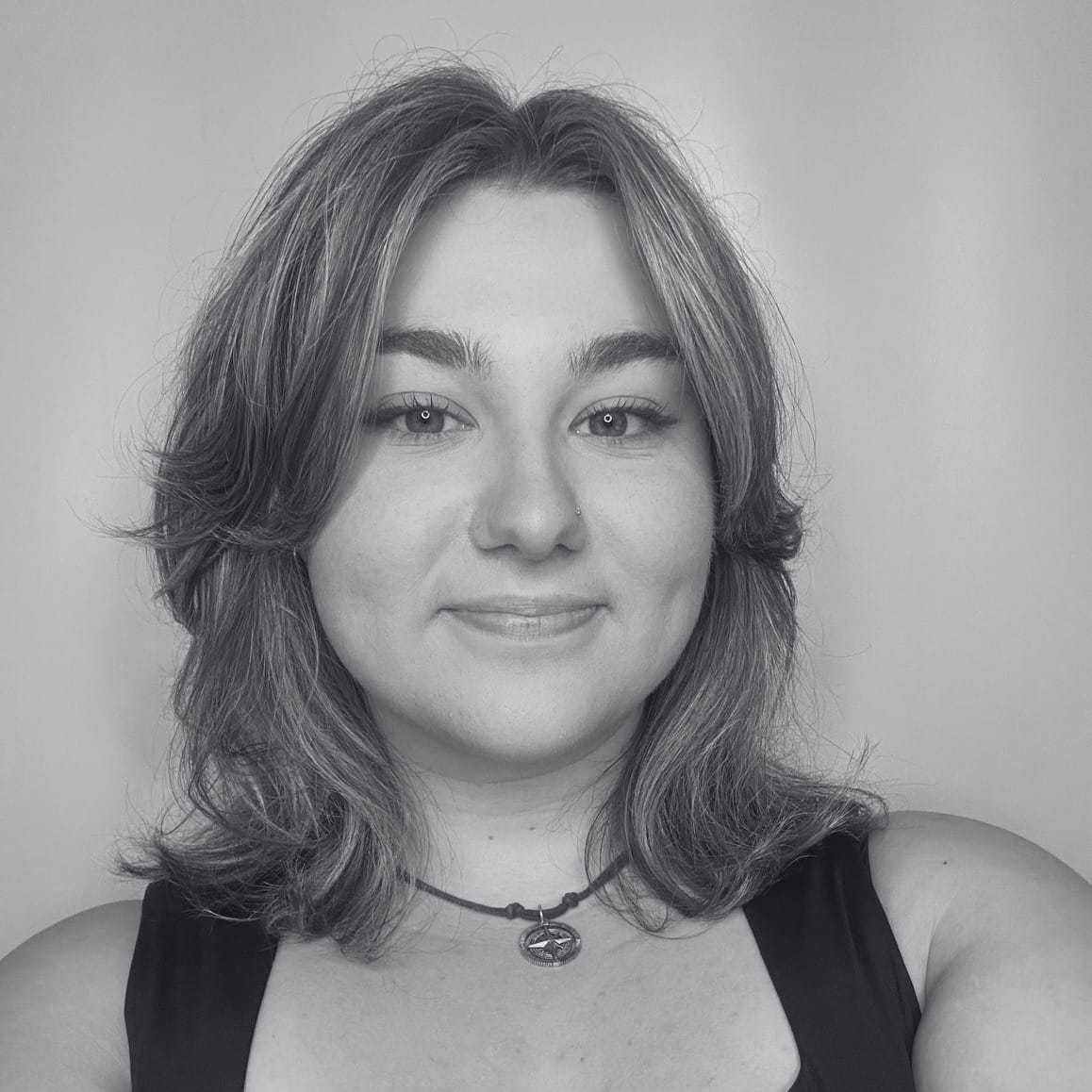 Portrait of ISABELLE ANTIL, a professional stylist at Cassandra Salon & Spa, showcasing their expertise and style.